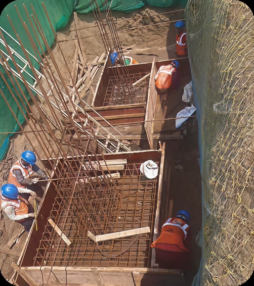 A render of three white cylindrical columns, against a warm creme background