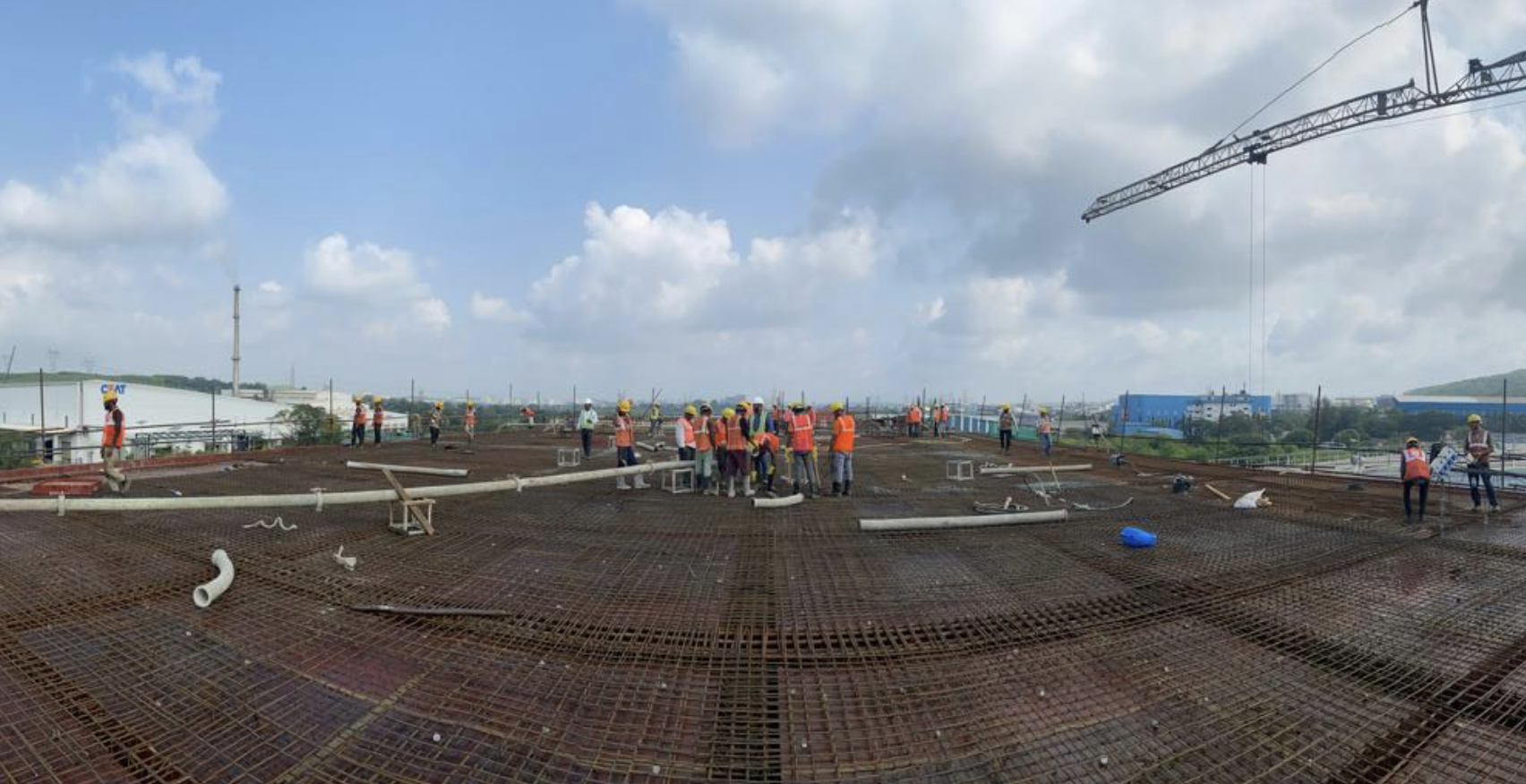 A image of a concrete sphere, balanced between two other larger spheres